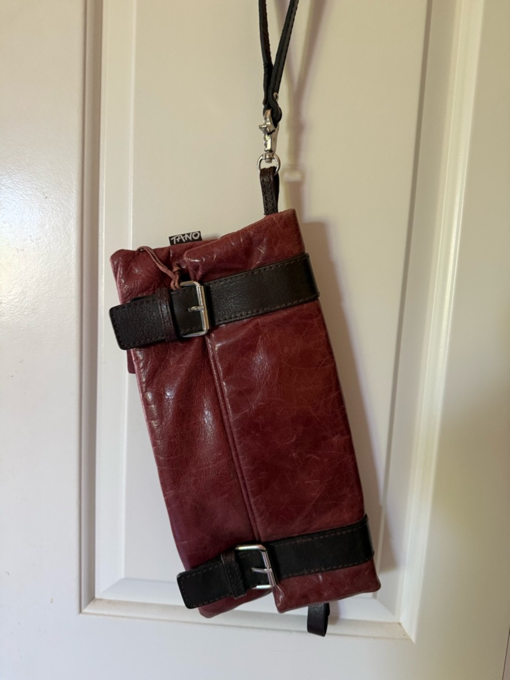TANO Burgundy Leather clutch Bag with Buckle Detail